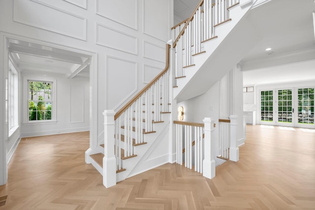 85 Dorchester Dr, Manhasset, NY 11030 - staircase featuring a decorative wall and recessed lighting