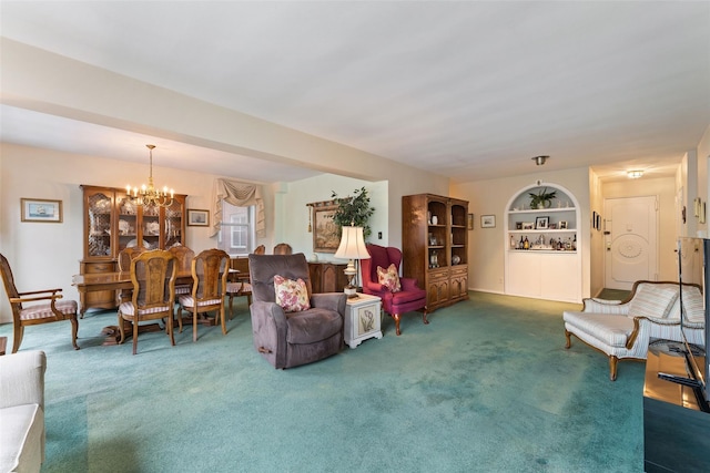 living room featuring dark carpet, an inviting chandelier, and built in shelves