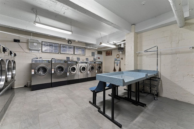 laundry room with separate washer and dryer