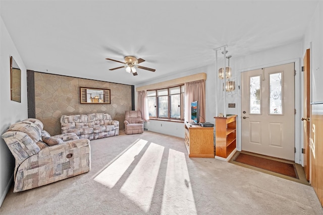 living room featuring ceiling fan and light carpet