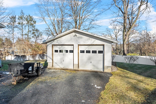 garage with a yard