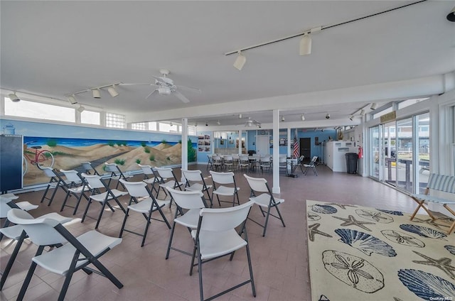 interior space featuring ceiling fan