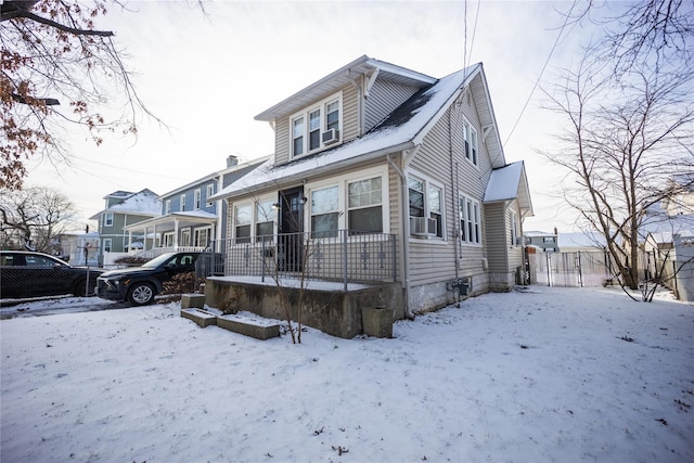 bungalow-style home featuring cooling unit