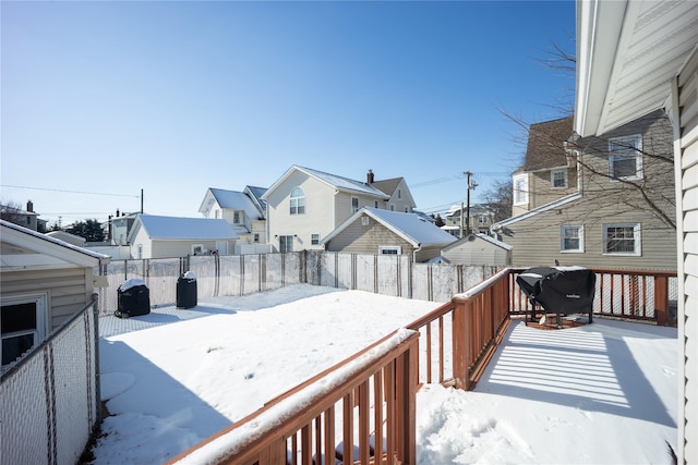 view of snow covered deck