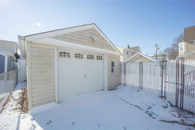 view of snow covered garage