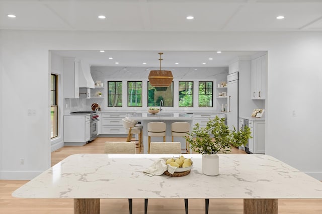 16 Hampton St, Westhampton Beach, NY 11978 - kitchen featuring open shelves, stainless steel stove, white cabinetry, and recessed lighting
