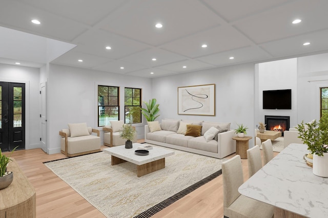 16 Hampton St, Westhampton Beach, NY 11978 - living area with light wood-style flooring, healthy amount of natural light, recessed lighting, and a large fireplace