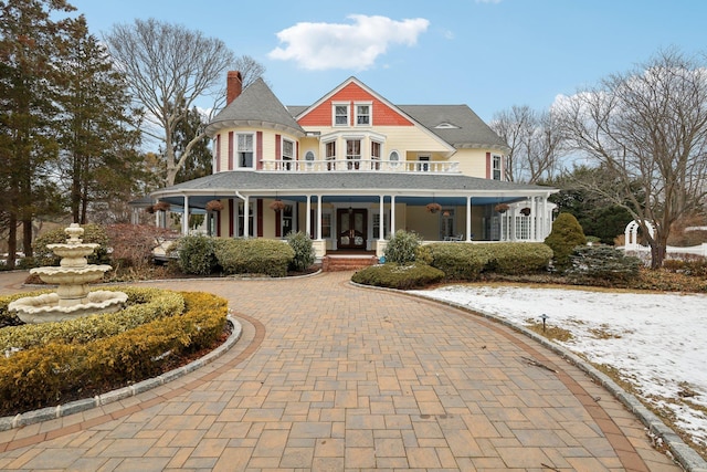 victorian home featuring a porch