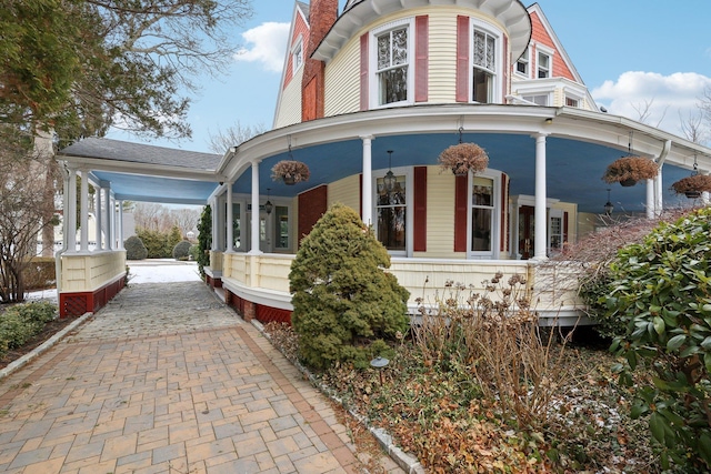 view of home's exterior with a porch