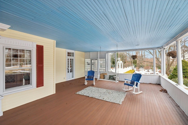 wooden terrace featuring a porch