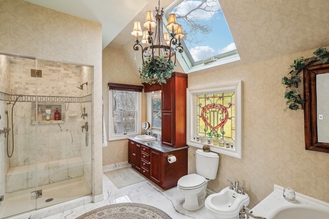 full bathroom featuring a bidet, lofted ceiling with skylight, vanity, independent shower and bath, and toilet