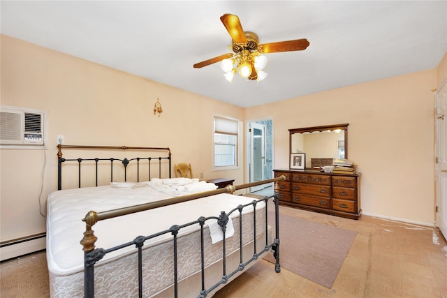 bedroom with baseboard heating, ceiling fan, and a wall unit AC