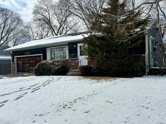 view of front of property featuring a garage