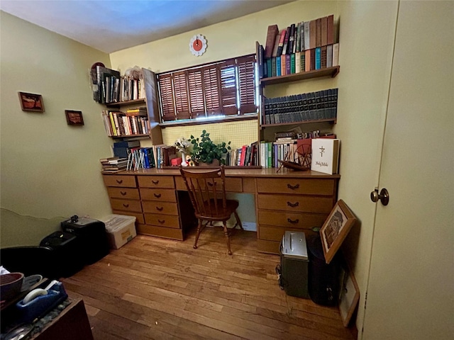 home office featuring hardwood / wood-style flooring