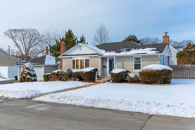 single story home featuring a garage