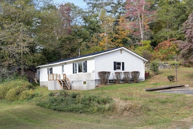 view of front of home with a front yard