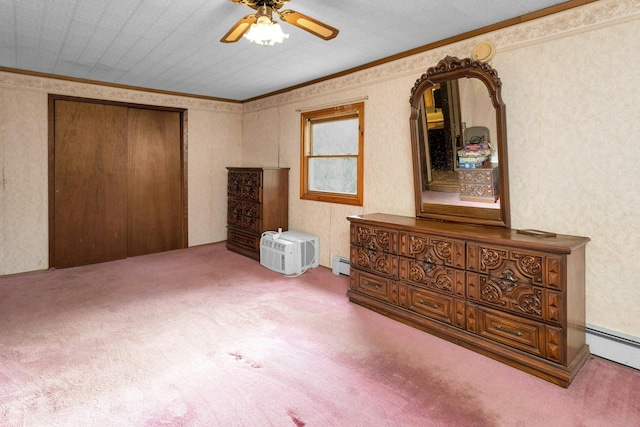 bedroom featuring ceiling fan, baseboard heating, carpet, and ornamental molding