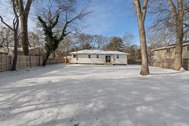 view of snow covered property