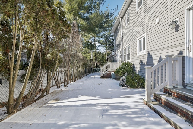 view of yard covered in snow