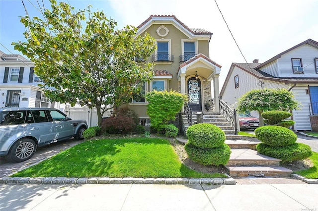 view of front of house with a front lawn