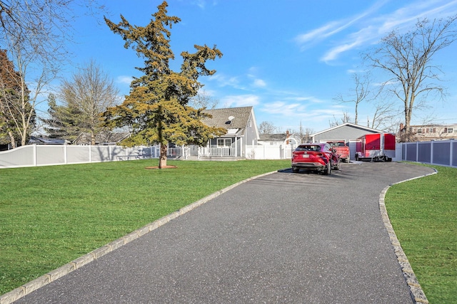 exterior space featuring a front yard