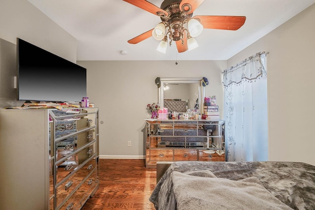 bedroom featuring dark hardwood / wood-style floors and ceiling fan