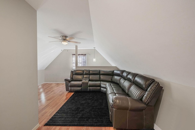 living room with lofted ceiling, light hardwood / wood-style floors, and ceiling fan