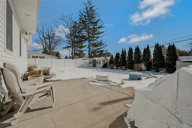 view of patio / terrace featuring an outbuilding