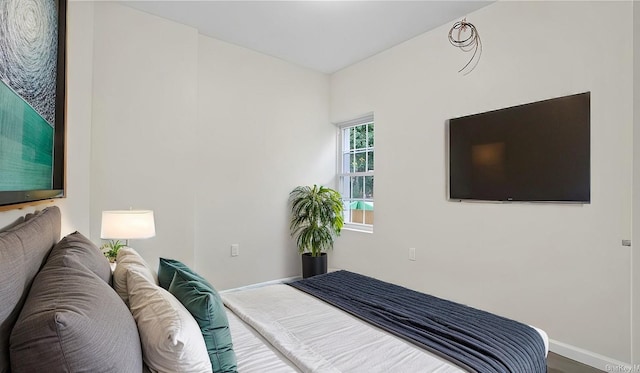 bedroom featuring hardwood / wood-style floors