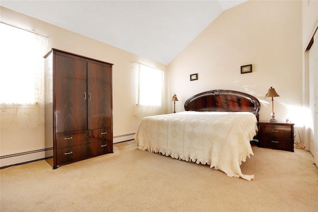 bedroom with light carpet, vaulted ceiling, and a baseboard heating unit