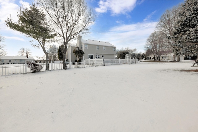 view of yard covered in snow