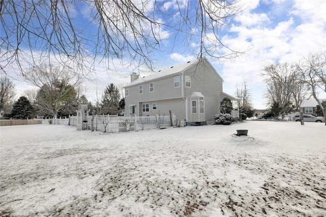 view of snow covered property