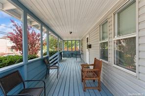 wooden terrace with covered porch