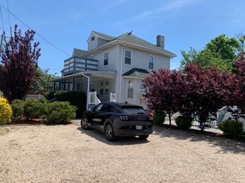 view of front of home with a balcony