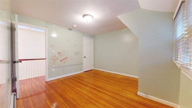 empty room featuring hardwood / wood-style floors