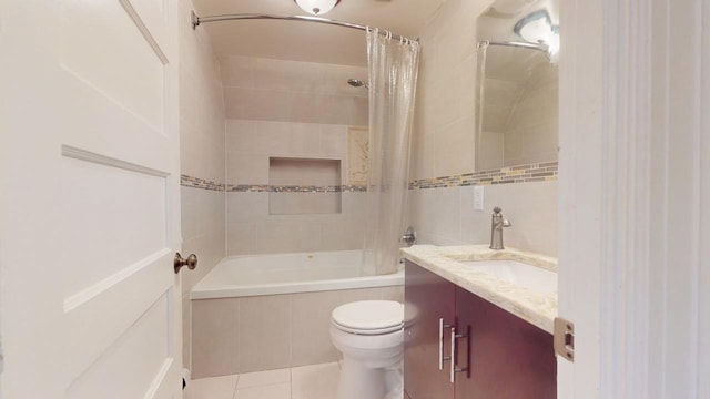 full bathroom featuring vanity, shower / tub combo, tile patterned floors, and toilet