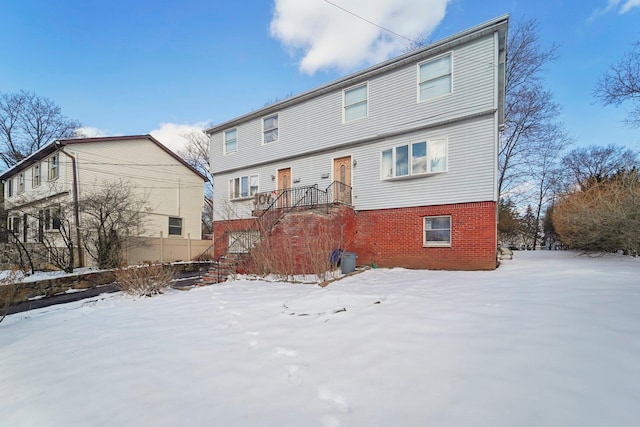 view of snow covered house