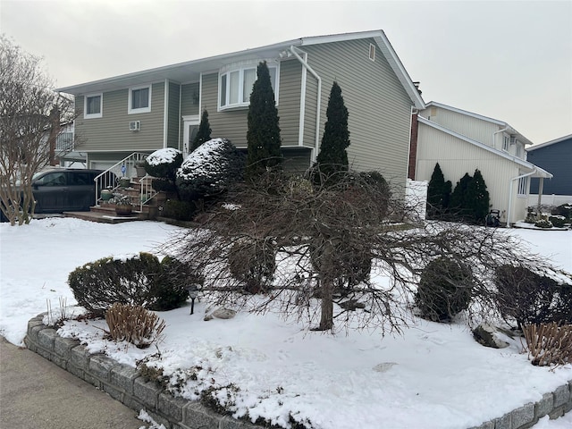 view of snow covered property