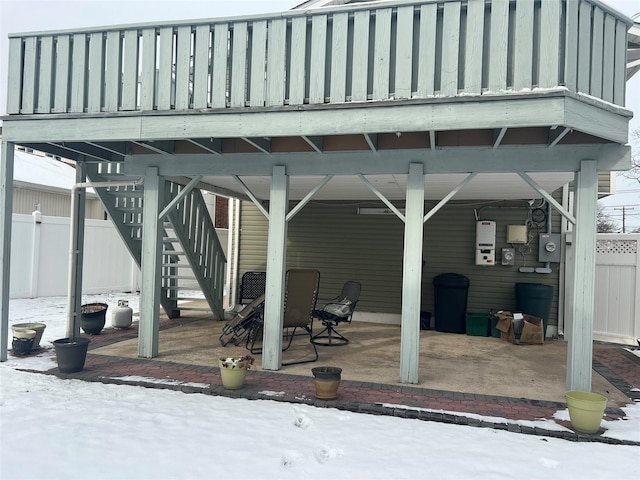 view of snow covered patio