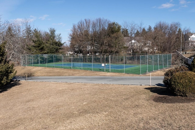 view of sport court with community basketball court and fence