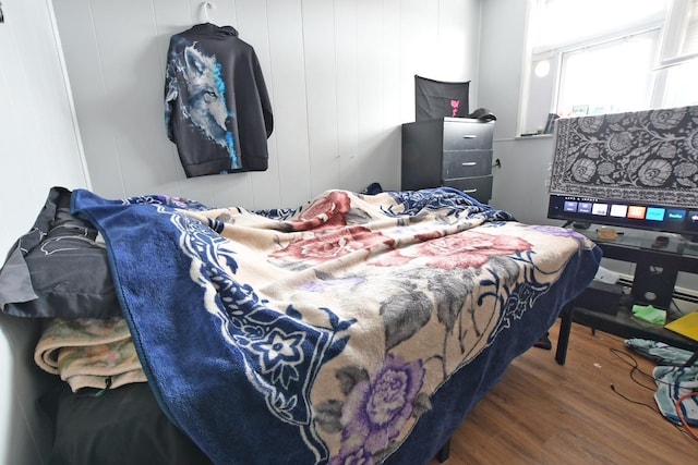 bedroom featuring dark wood-type flooring