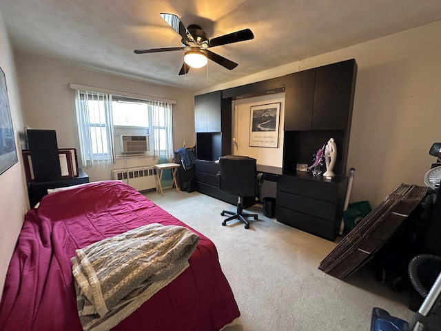 bedroom featuring ceiling fan, radiator heating unit, cooling unit, and light colored carpet