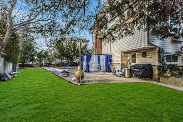 view of yard featuring a patio