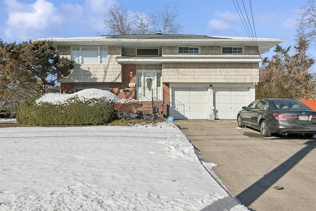 bi-level home featuring a garage