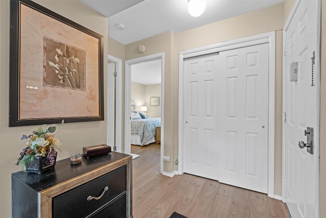 entryway with light hardwood / wood-style floors