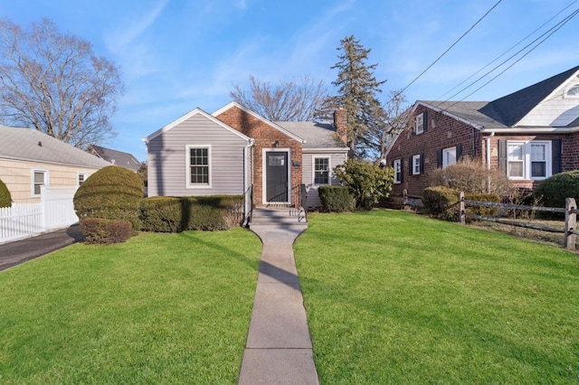 bungalow with a front lawn