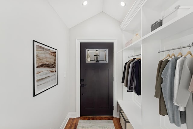 mudroom featuring vaulted ceiling and dark hardwood / wood-style floors