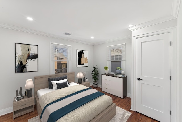 bedroom featuring dark hardwood / wood-style flooring and ornamental molding