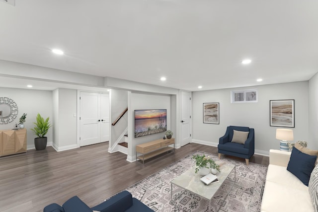 living room featuring dark wood-type flooring