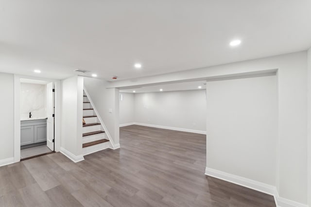 basement with wood-type flooring